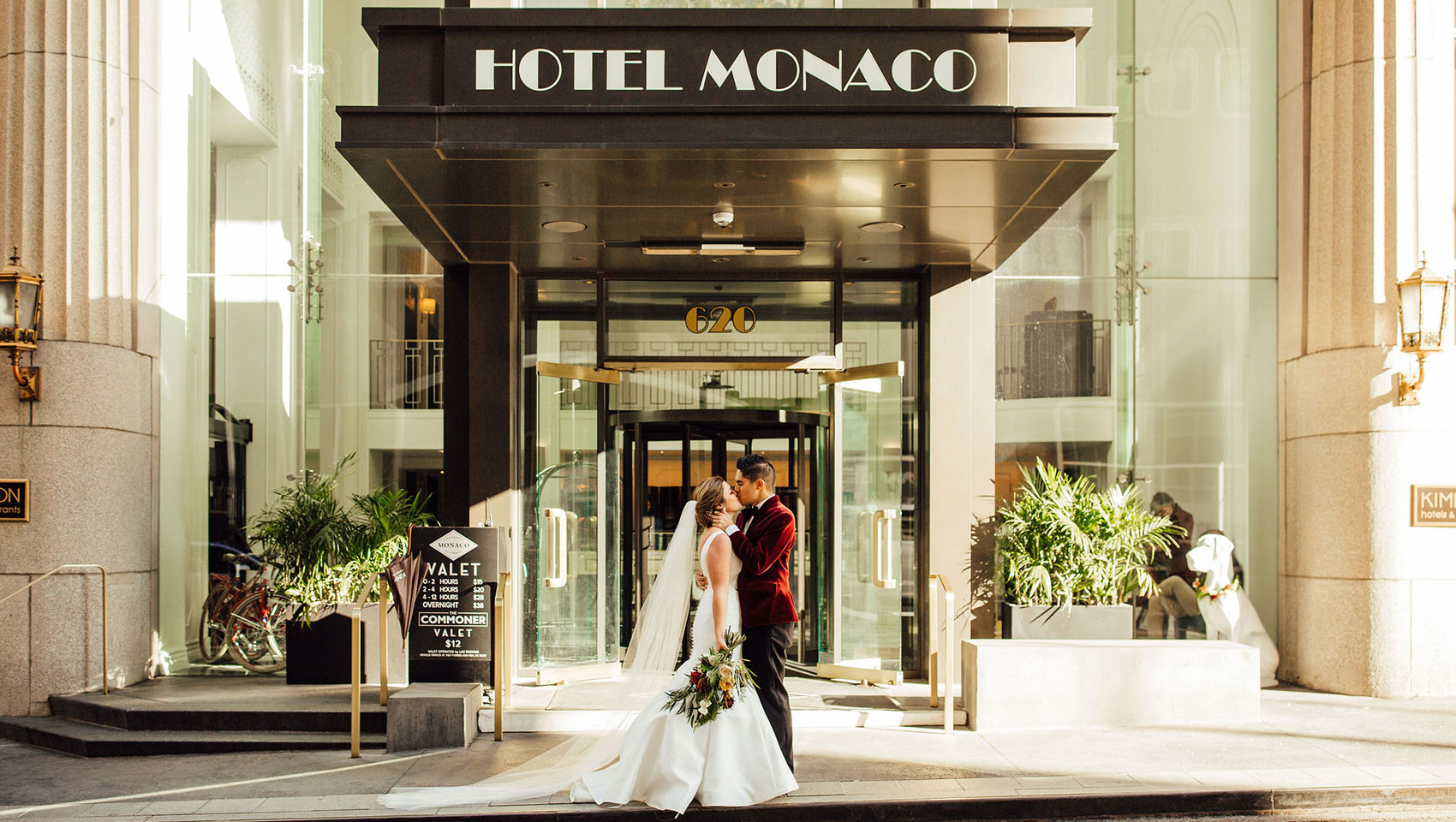Bride and Groom in front of Monaco Sign