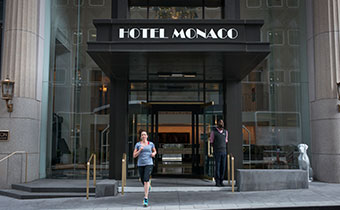 woman running outside hotel Monaco pittsburgh